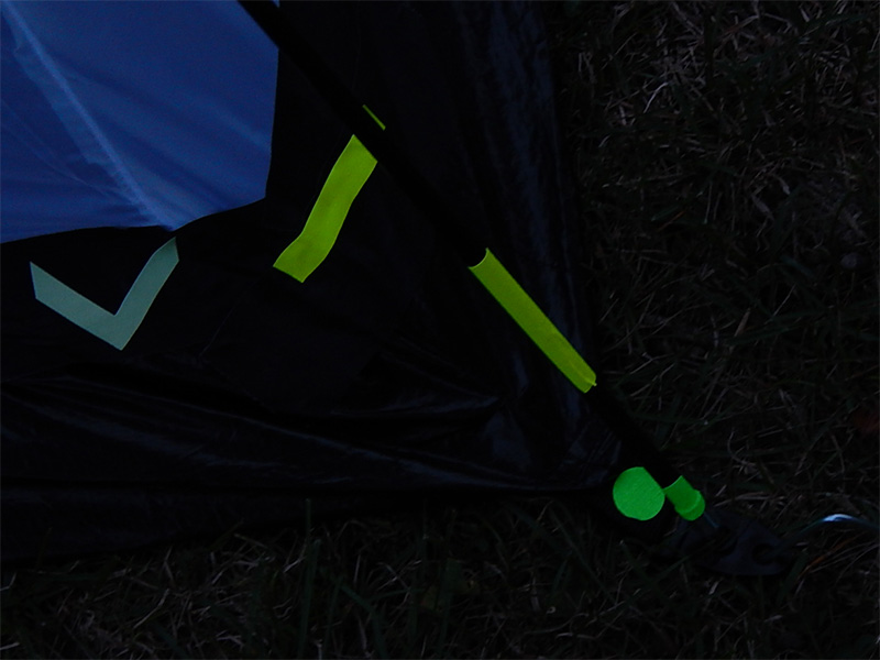 I continued with that thought and added the fluorescent strips on the poles and stakes all around the tent. I continued with that thought and added the fluorescent strips on the poles and stakes all around the tent.