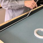After lining the picture frame rabbet with Pro® Fillet, the tape liner is removed for easy application of fillet to the frame. After lining the picture frame rabbet with Pro® Fillet, the tape liner is removed for easy application of fillet to the frame.